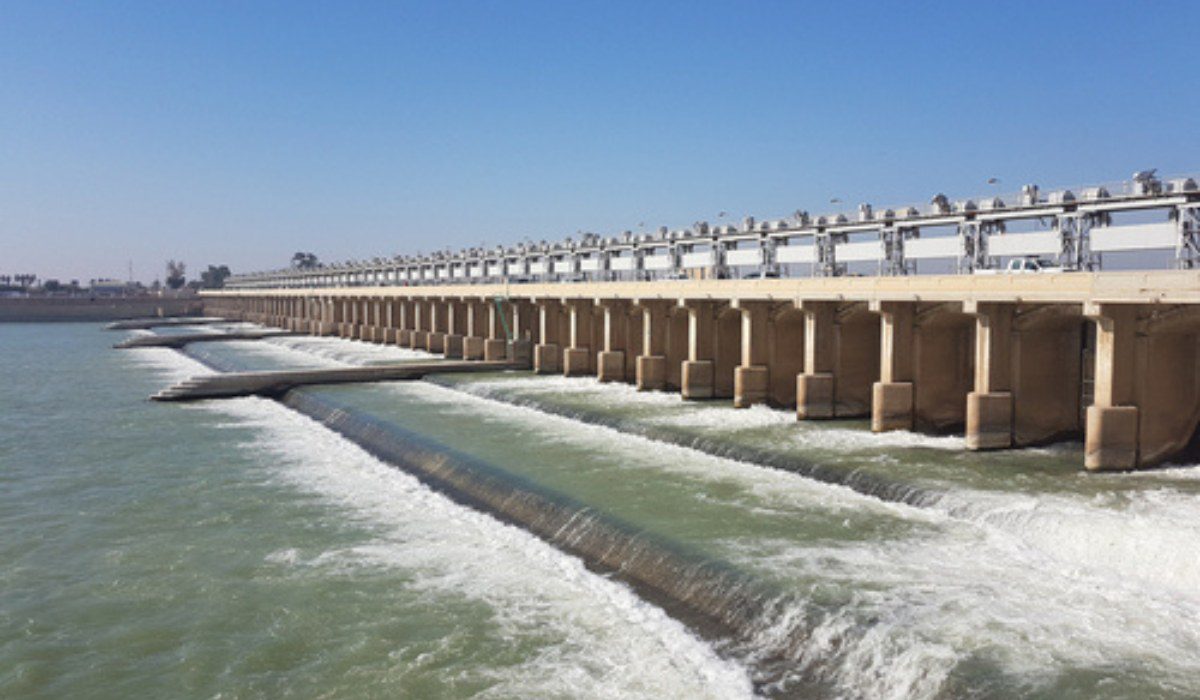 a-barrage-is-typically-constructed-across-a-river-that-is-flat-and