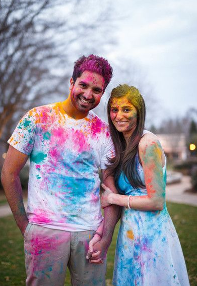 Couple playing Holi with a pichkari, Stock Photo, Picture And Royalty Free  Image. Pic. PNT-PIRF-20100204-SH0436 | agefotostock