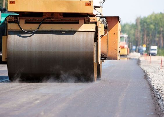 What is a bitumen road and how is it constructed?