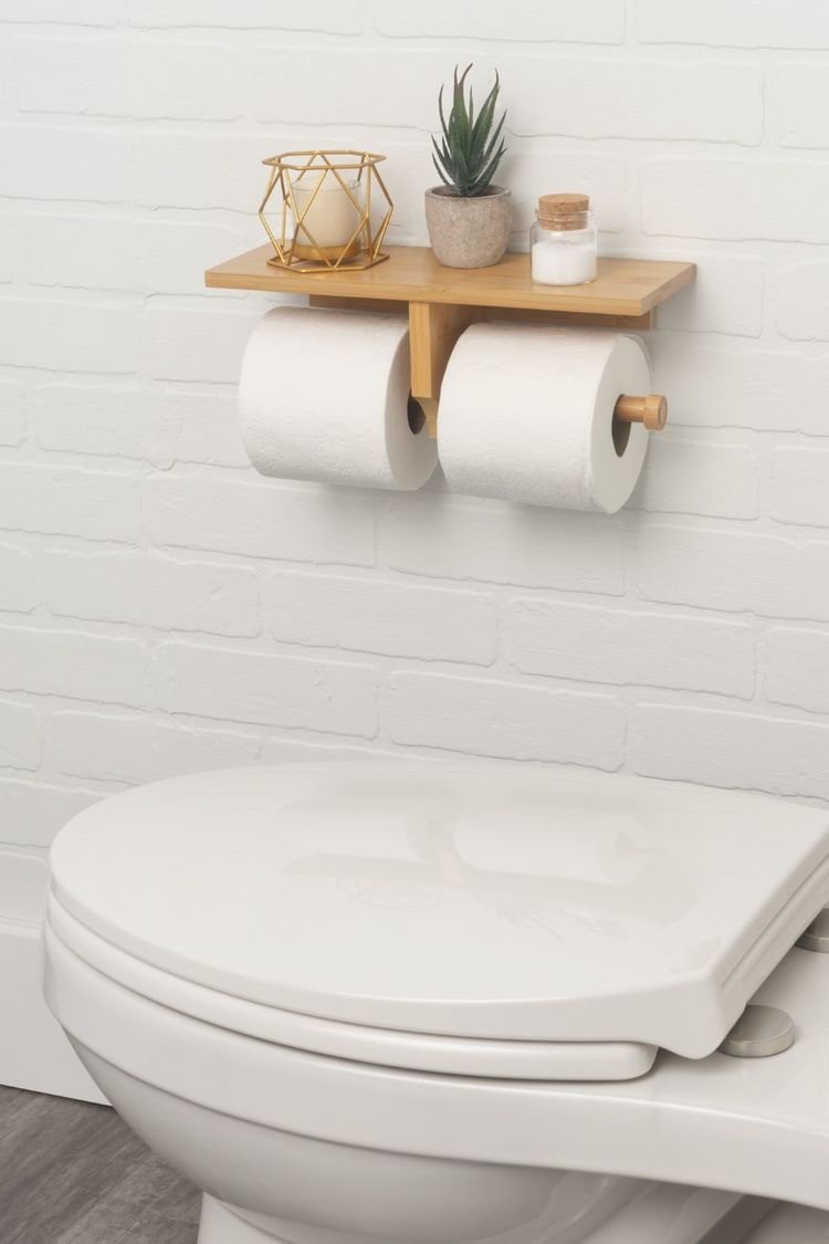 How to place a toilet paper holder?