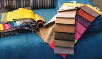 Is fabric or leather a better choice for sofa upholstery?